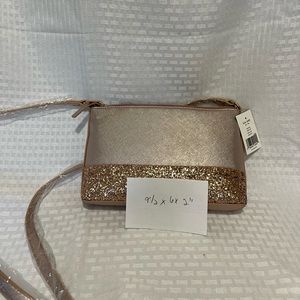 Kate spade pink crossbody. Never been used. Size posted on picture.